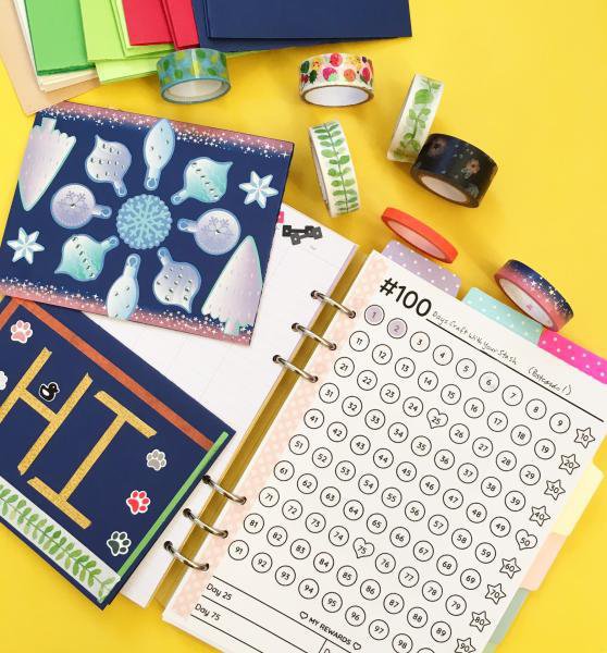 The 100-day project tracker in a ring binder
