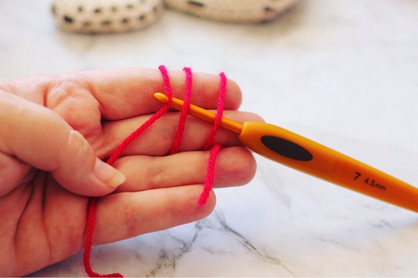 Red crochet heart - three stitches and crochet hook