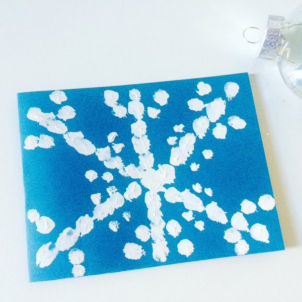 Finger painted holiday snowflake card